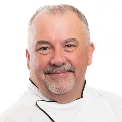 headshot of Tim Clinton